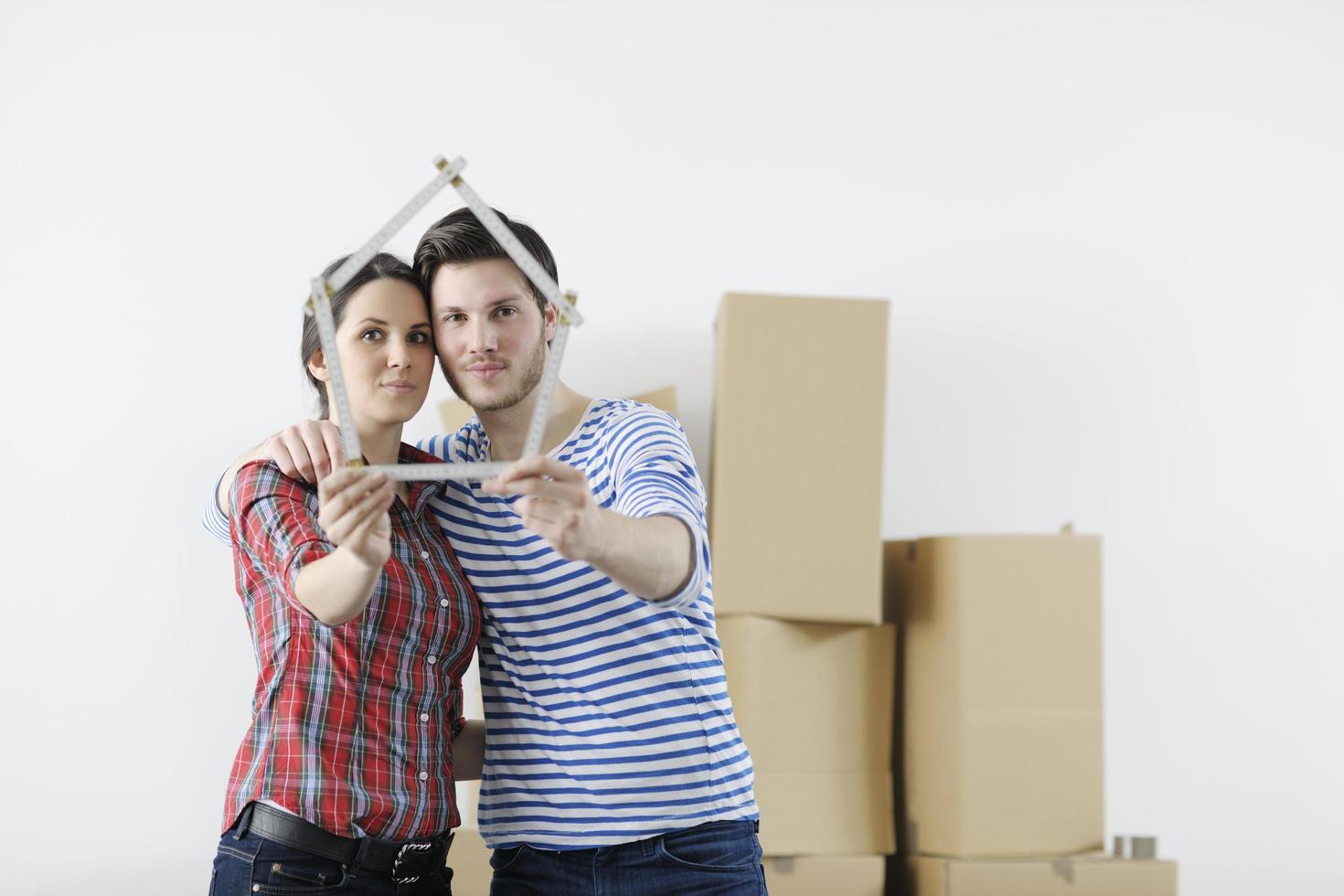 Young couple moving in new home photo