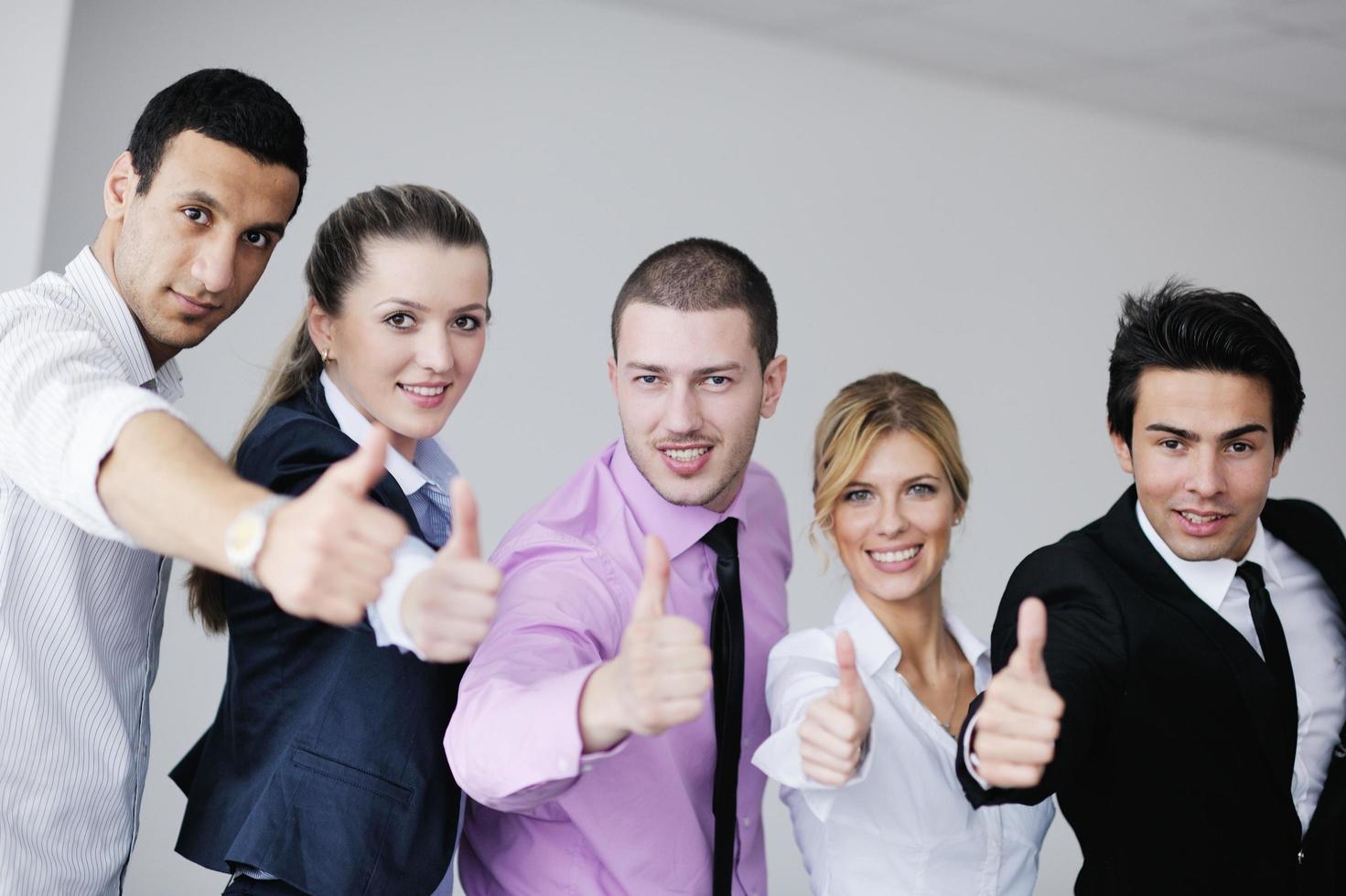 Group of young business people at meeting photo