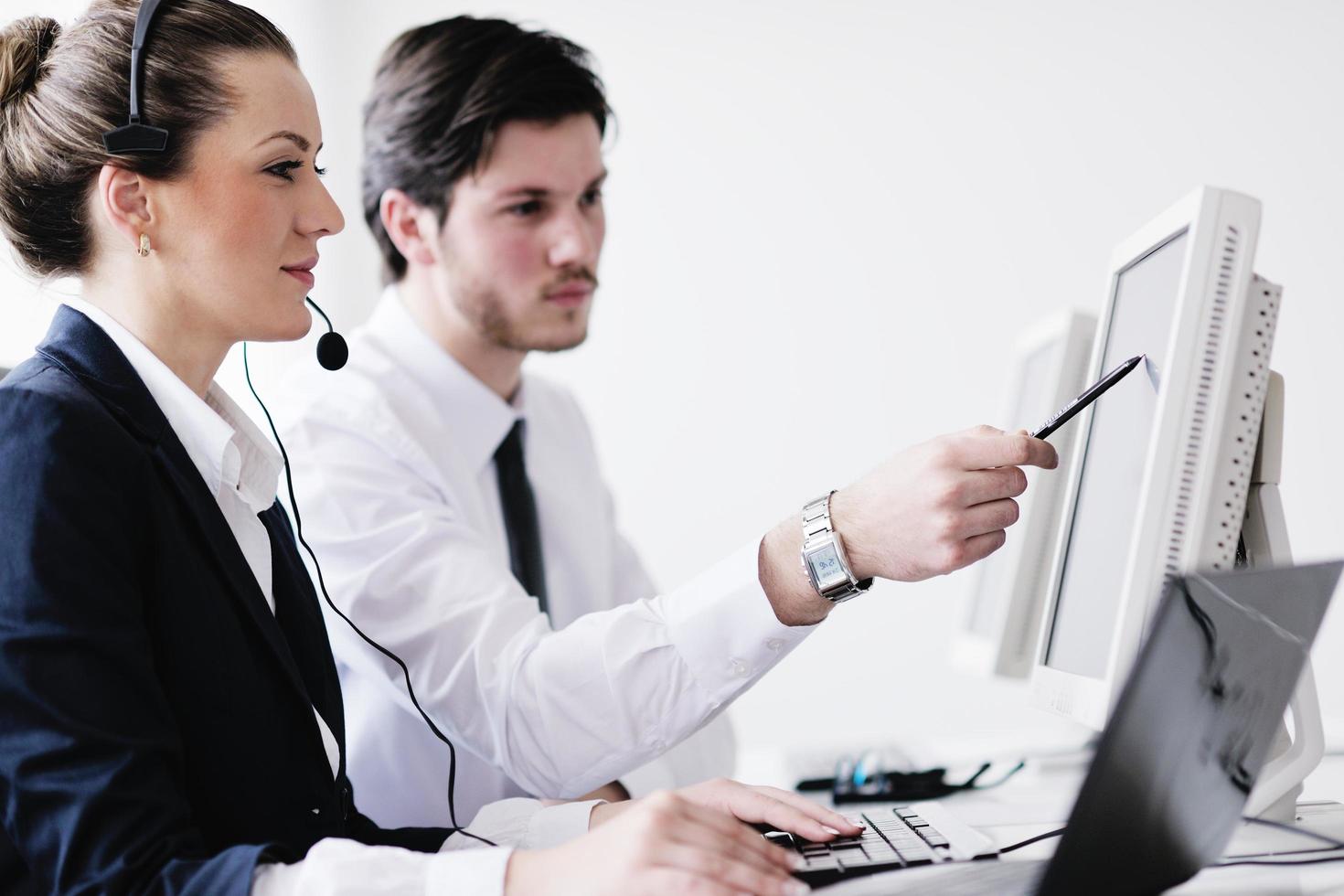 business people group working in customer and helpdesk office photo