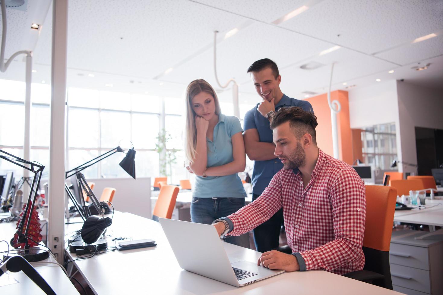 Group of young people employee workers with computer photo