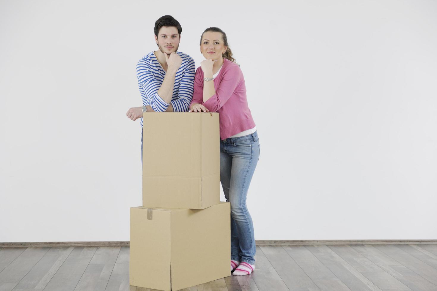 Young couple moving in new home photo