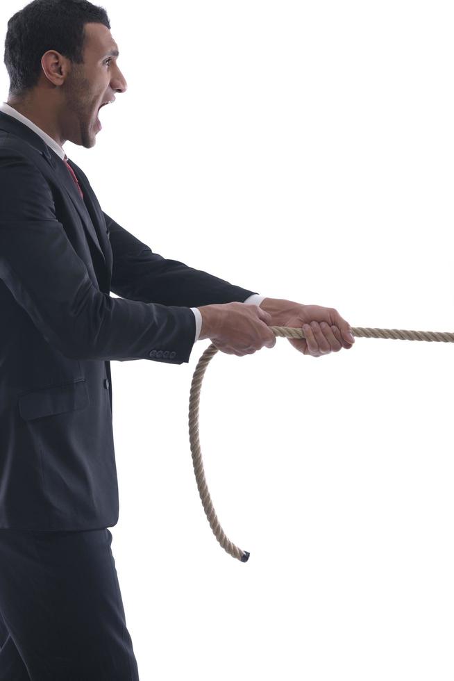 business man with rope isolated on white background photo