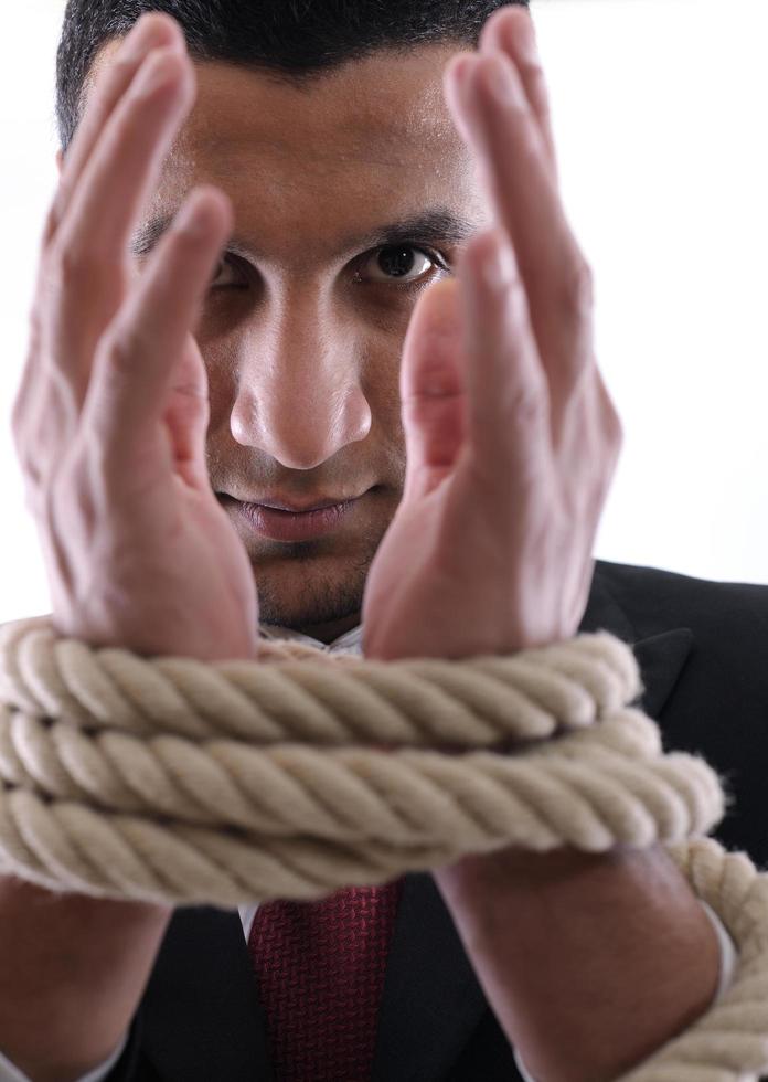 business man with rope isolated on white background photo