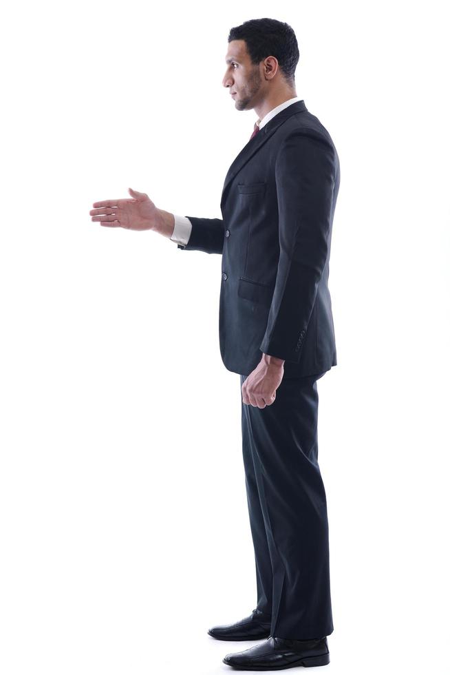 business man giving you a hand shake photo