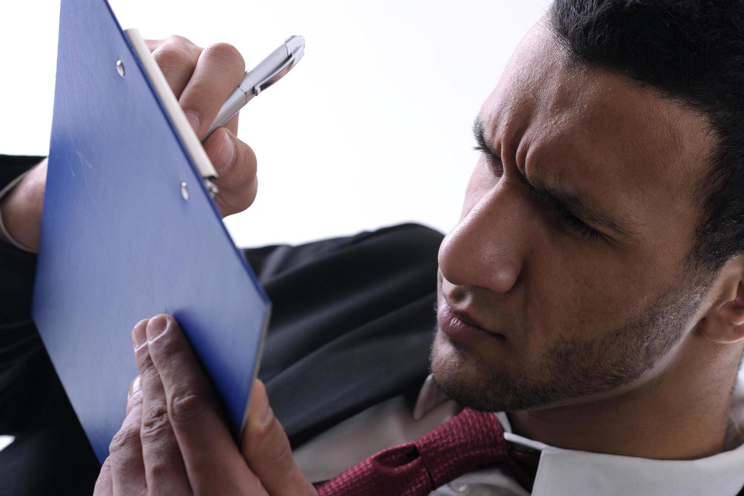 business man trying to read photo