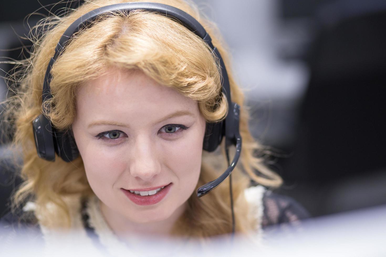female call centre operator doing her job photo