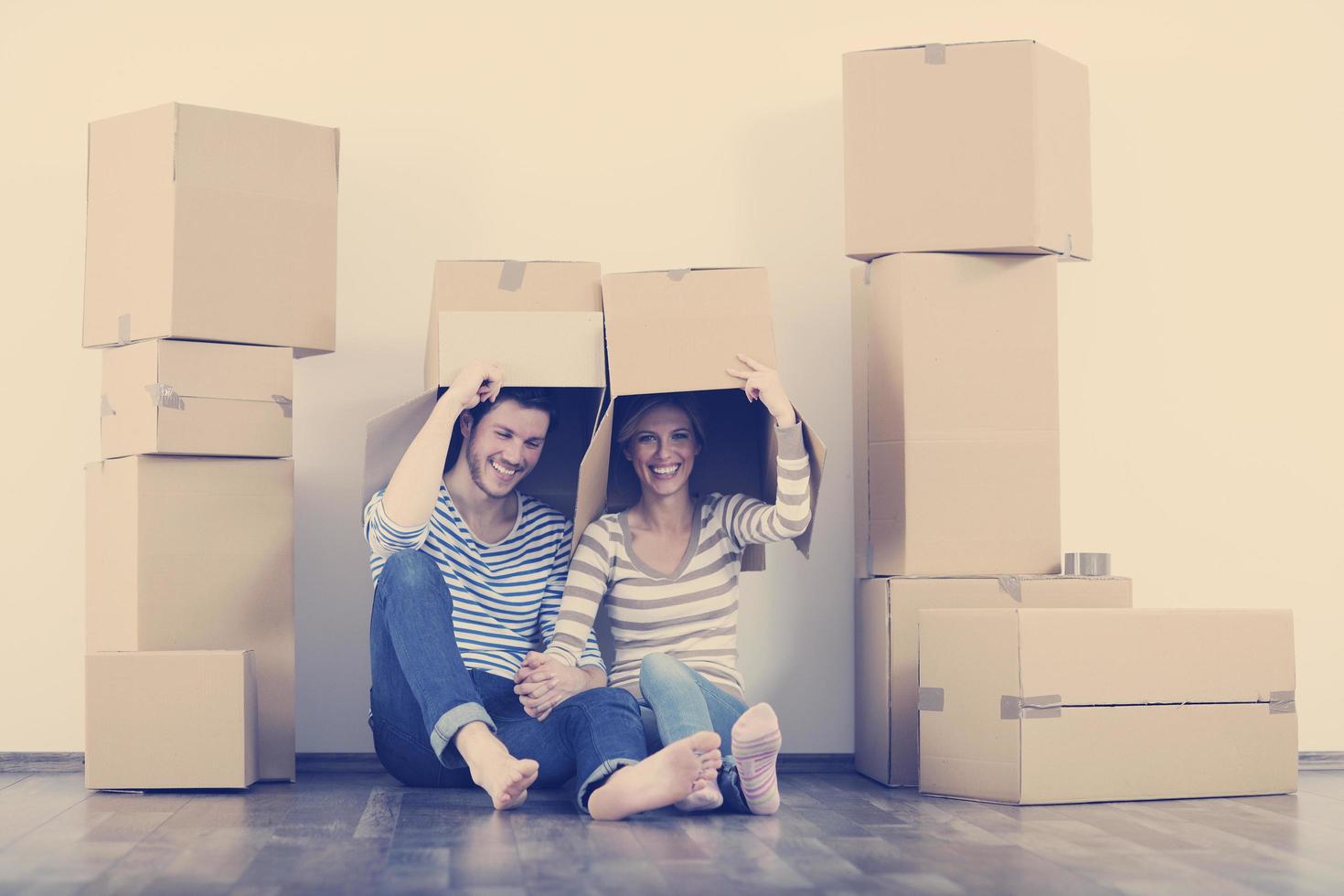 Young couple moving in new home photo