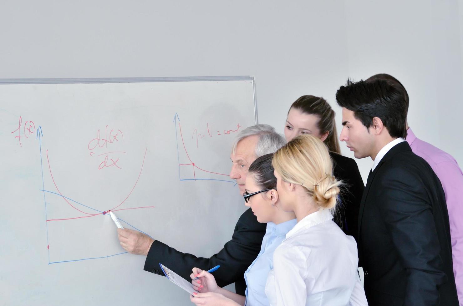 Senior business man giving a presentation photo