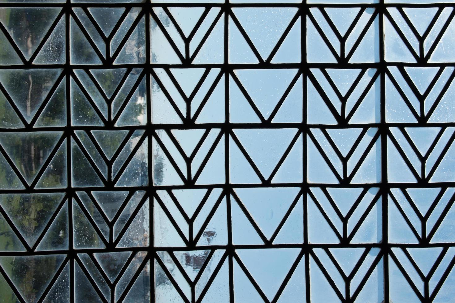 Glass window with a metallic design. France photo