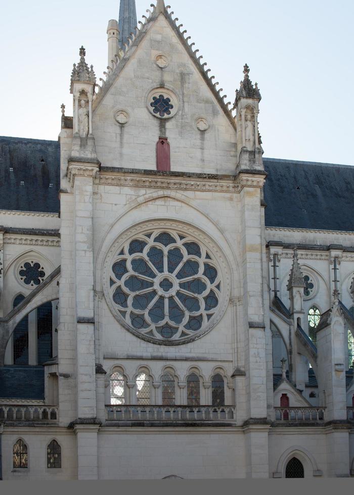 Detail of the facade of Nantes cathedral. Rose window. France photo