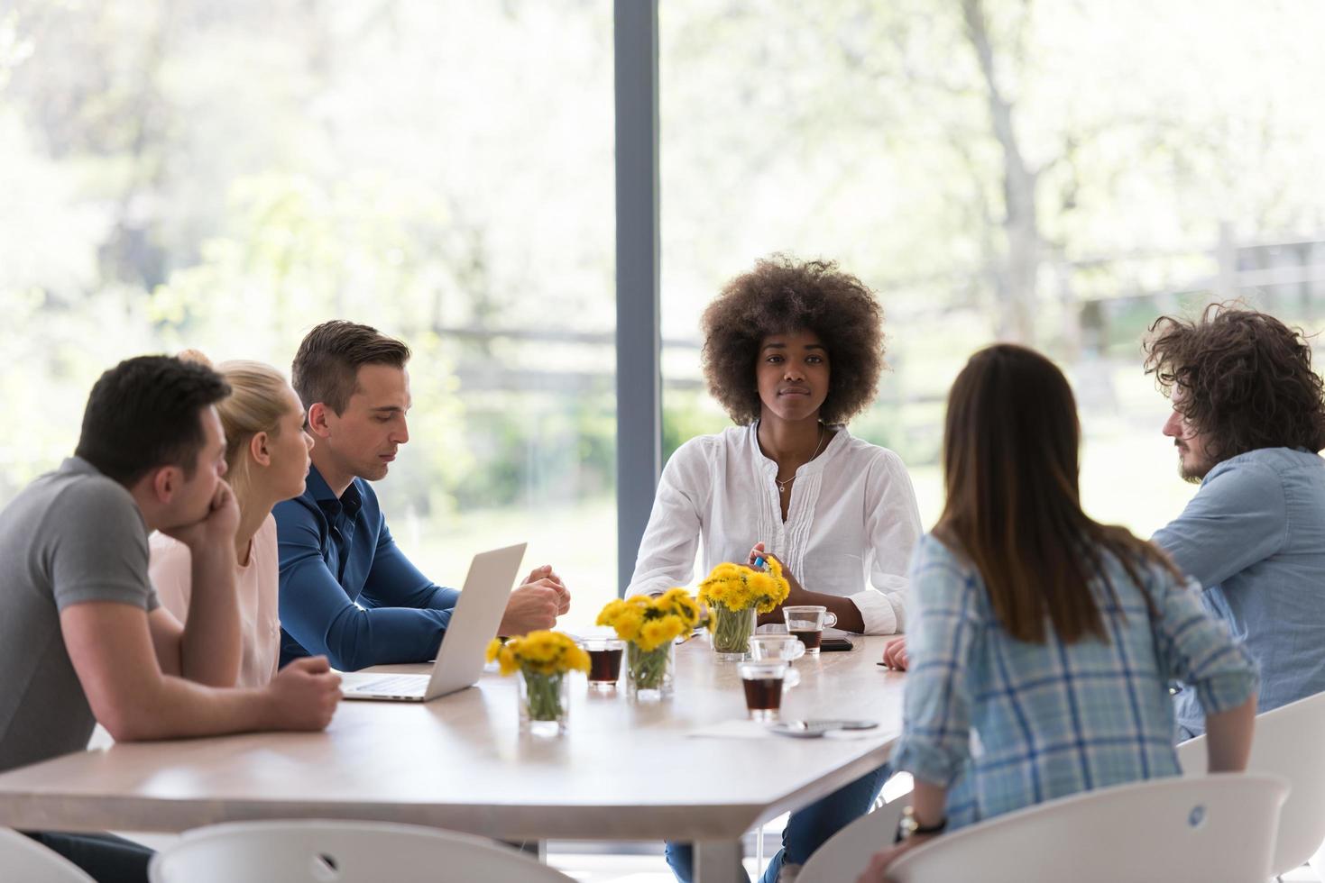 Multiethnic startup business team on meeting photo