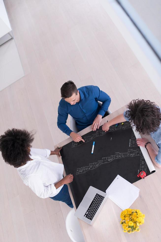 top view of Multiethnic startup business team on meeting photo
