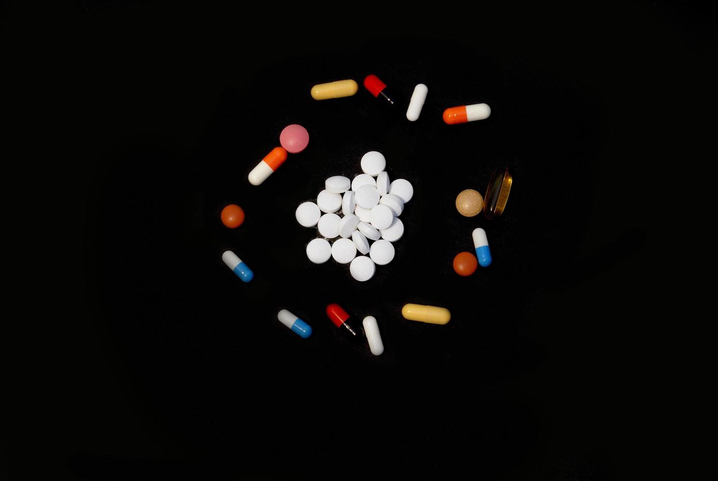 pills on black photo