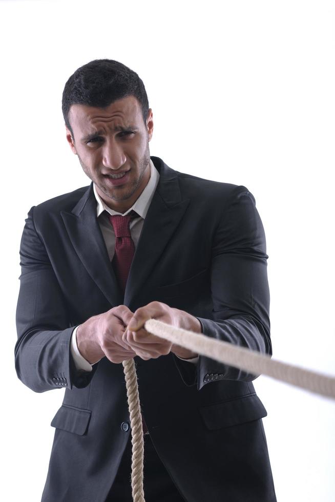 business man with rope isolated on white background photo