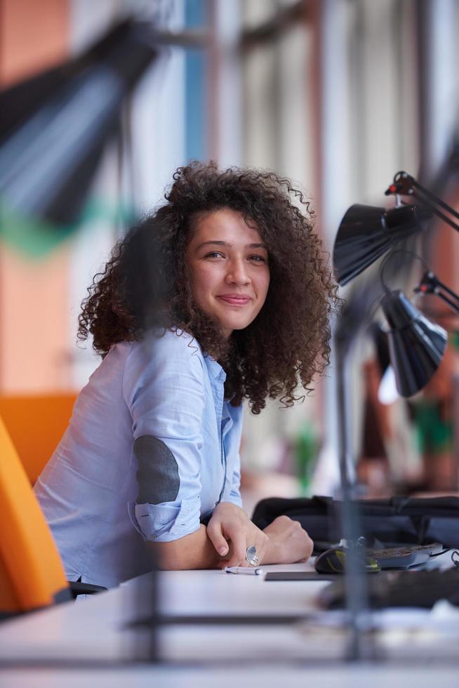 young  business woman at office photo