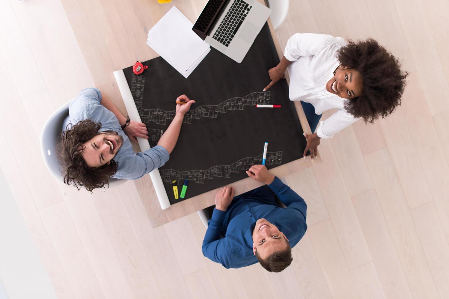 top view of Multiethnic startup business team on meeting photo