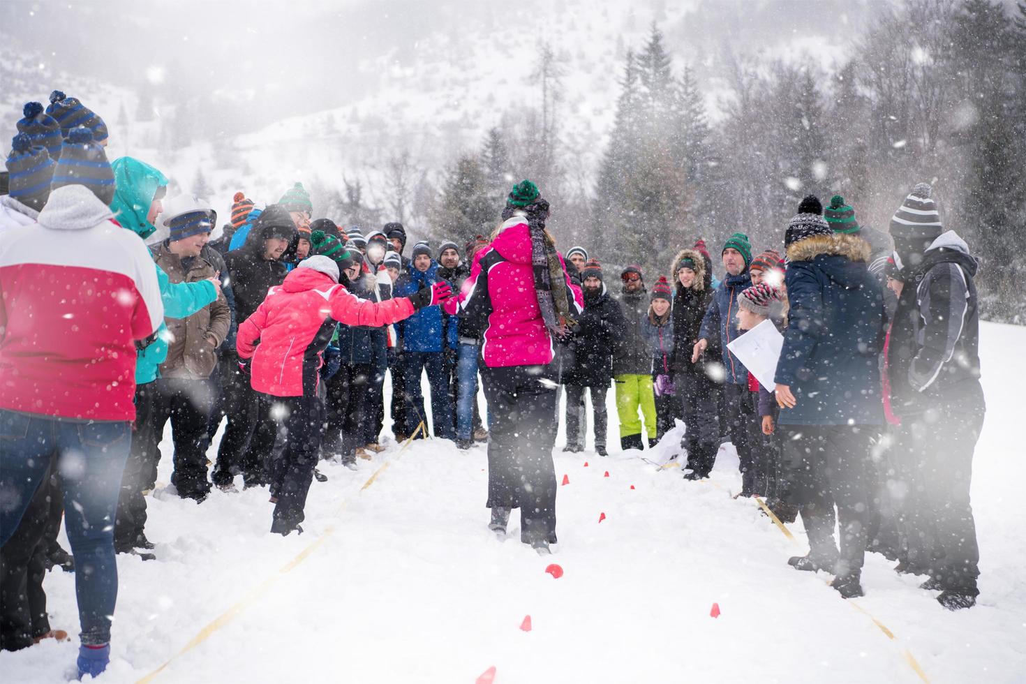 group of young people having blindfolded games competition photo