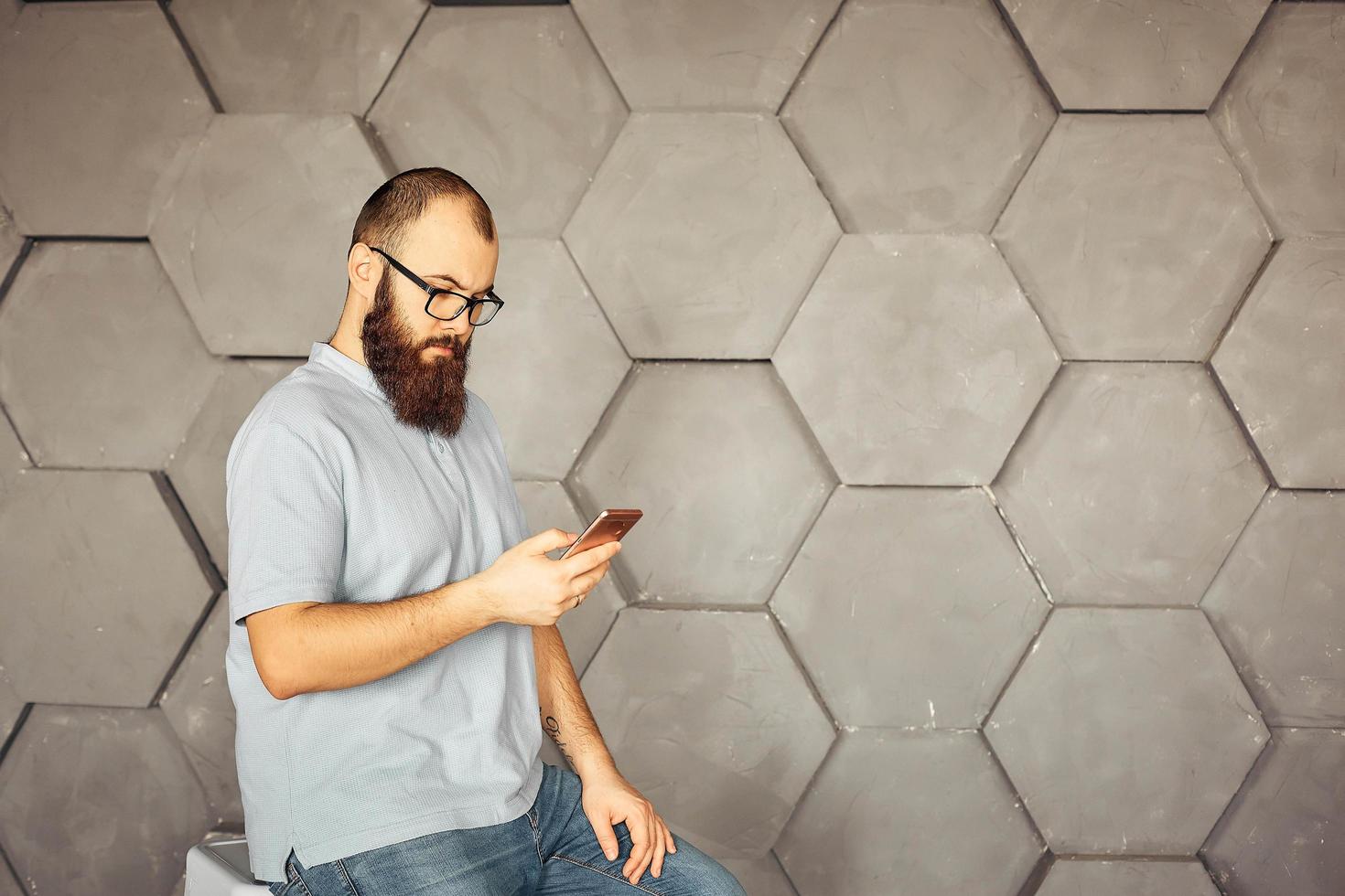 business man messaging or texting using phone. communication and mobile technology. photo
