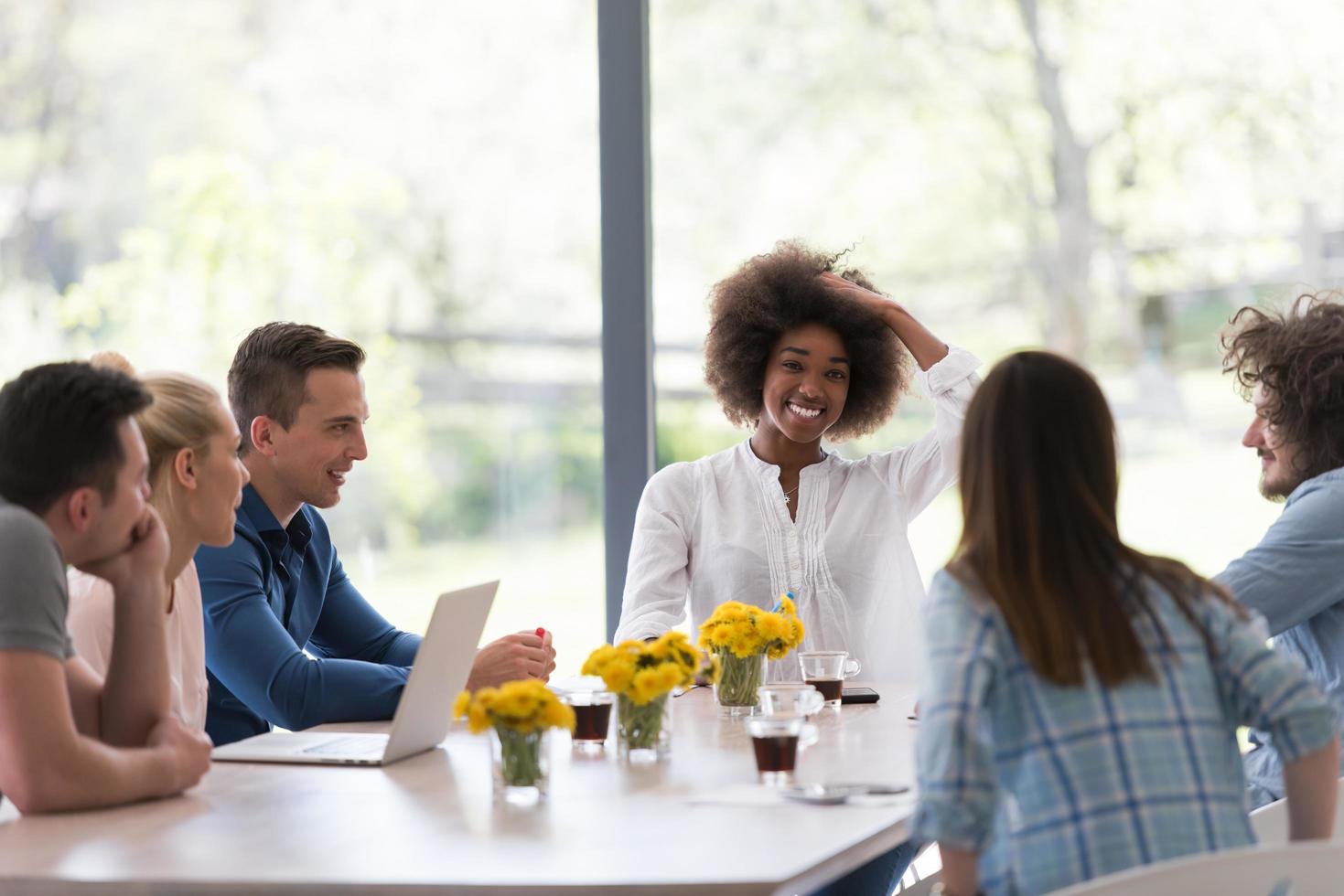 Multiethnic startup business team on meeting photo