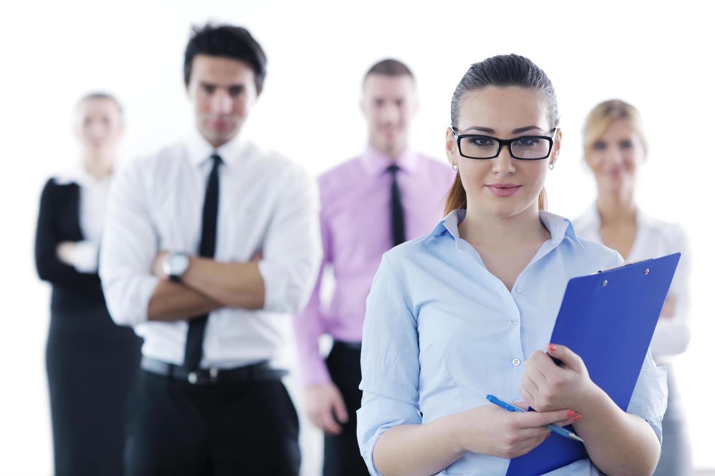 business woman standing with her staff in background photo