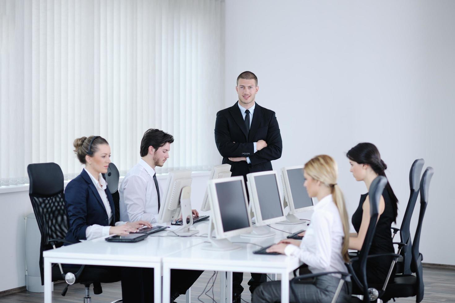 business people group working in customer and helpdesk office photo