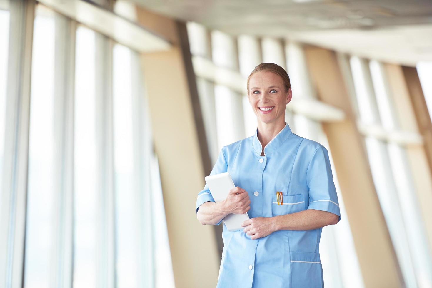 female doctor with tablet computer photo