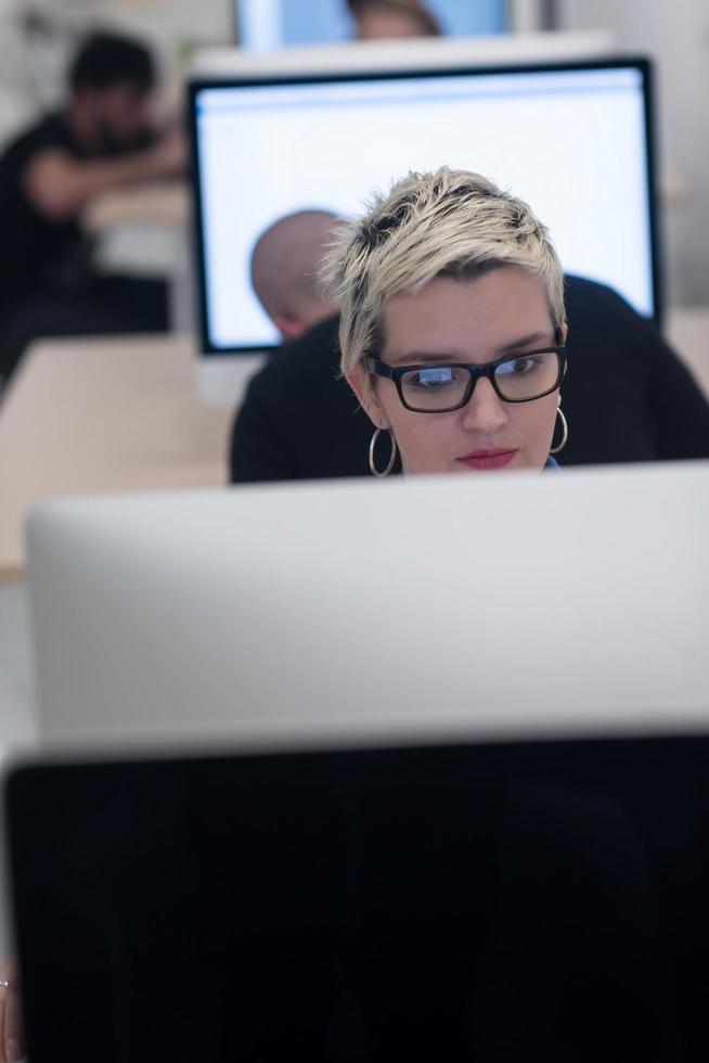 startup business, woman  working on desktop computer photo