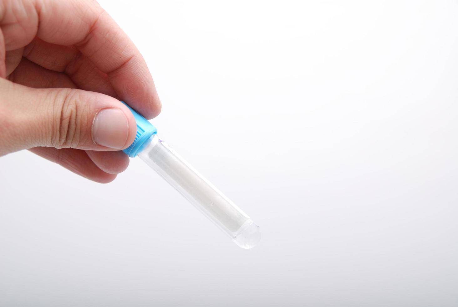 test-tube in woman hand photo