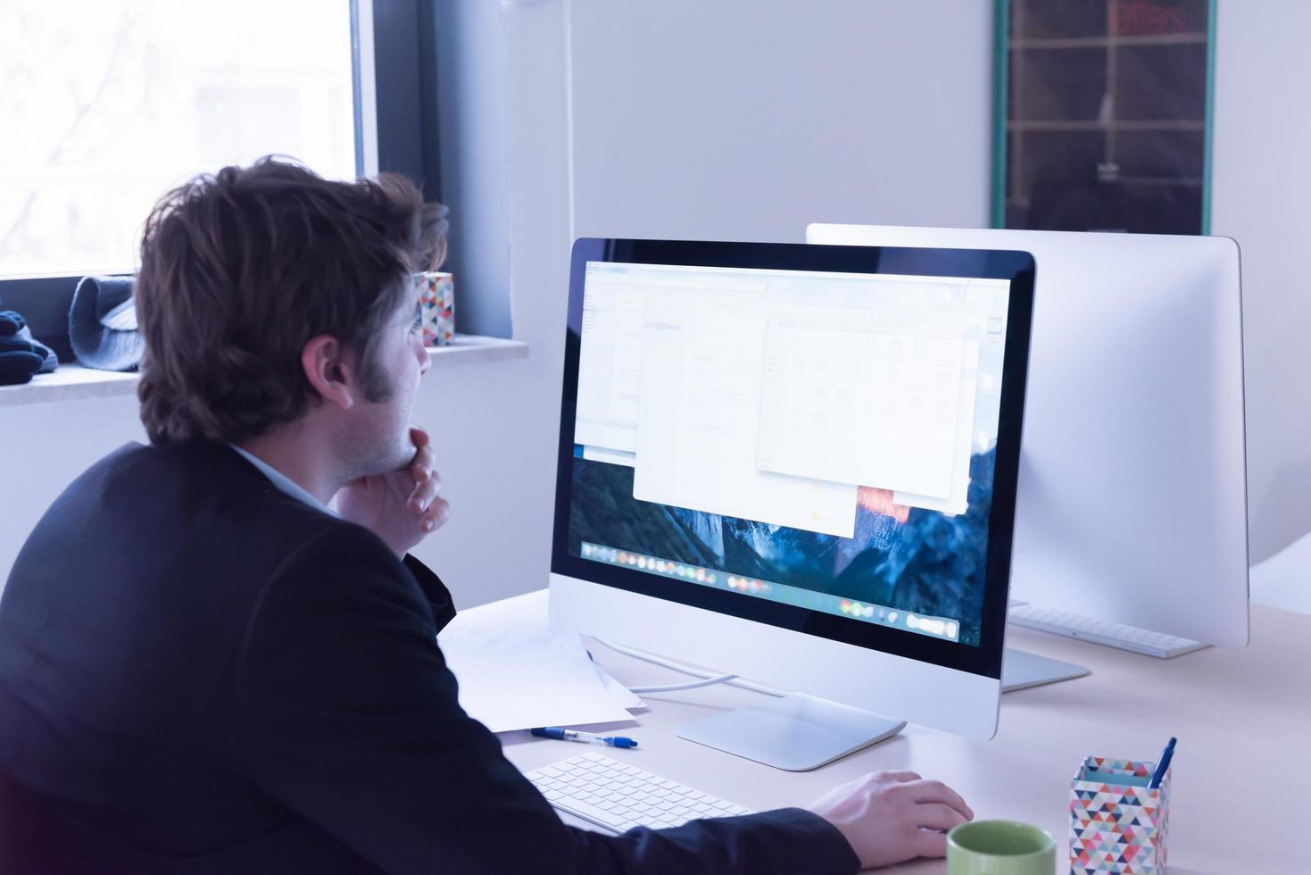 startup business, software developer working on computer photo