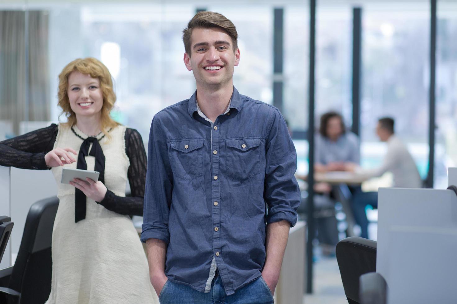 Business People Working With Tablet in startup office photo