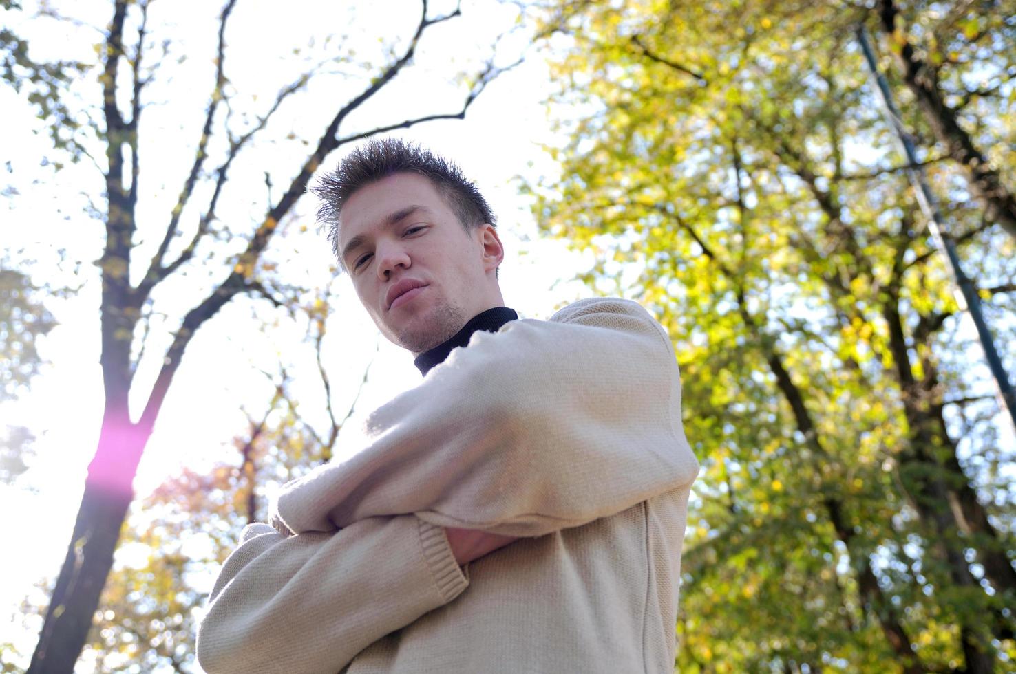 happy young casual man outdoor portrait posing photo