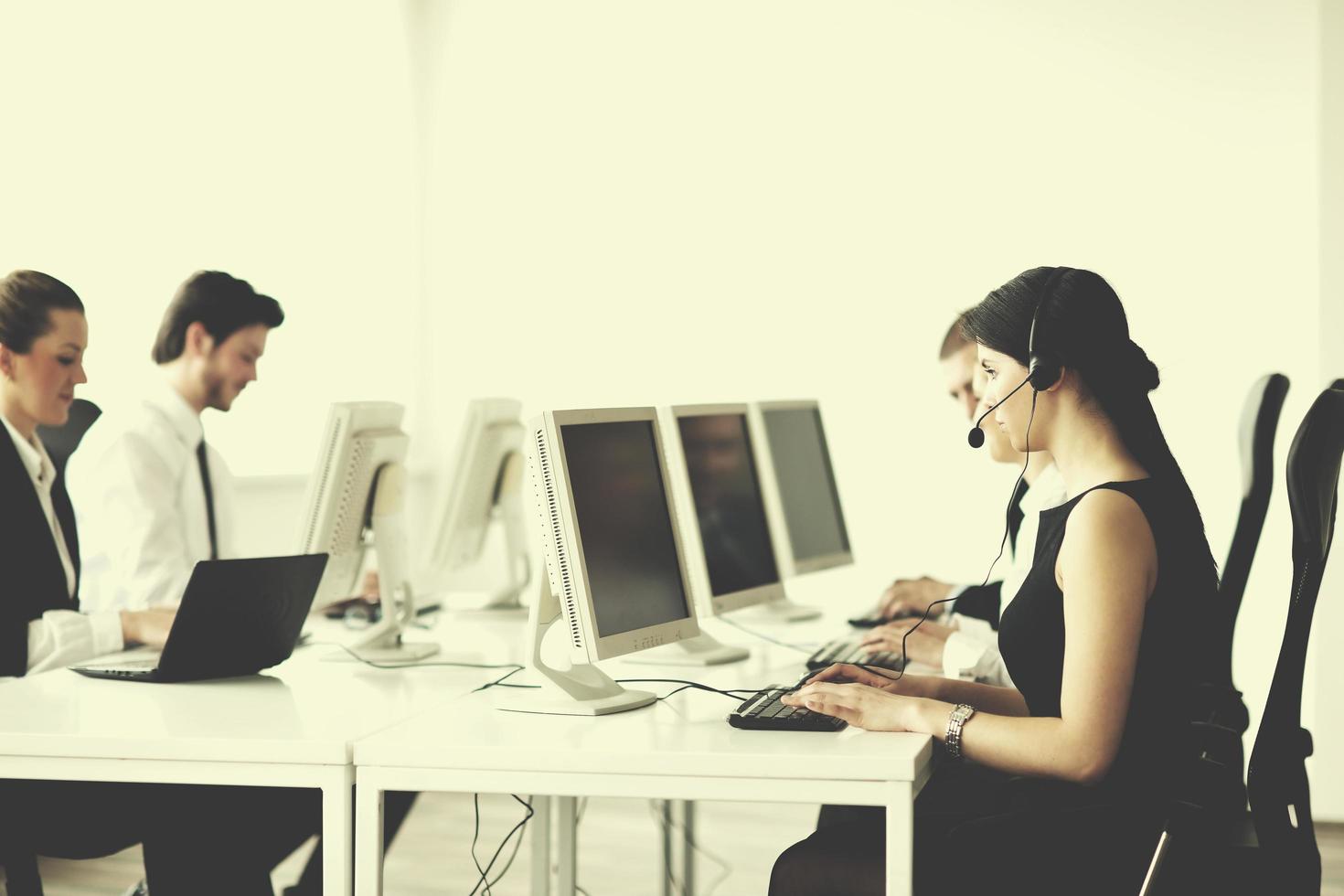 business people group working in customer and help desk office photo