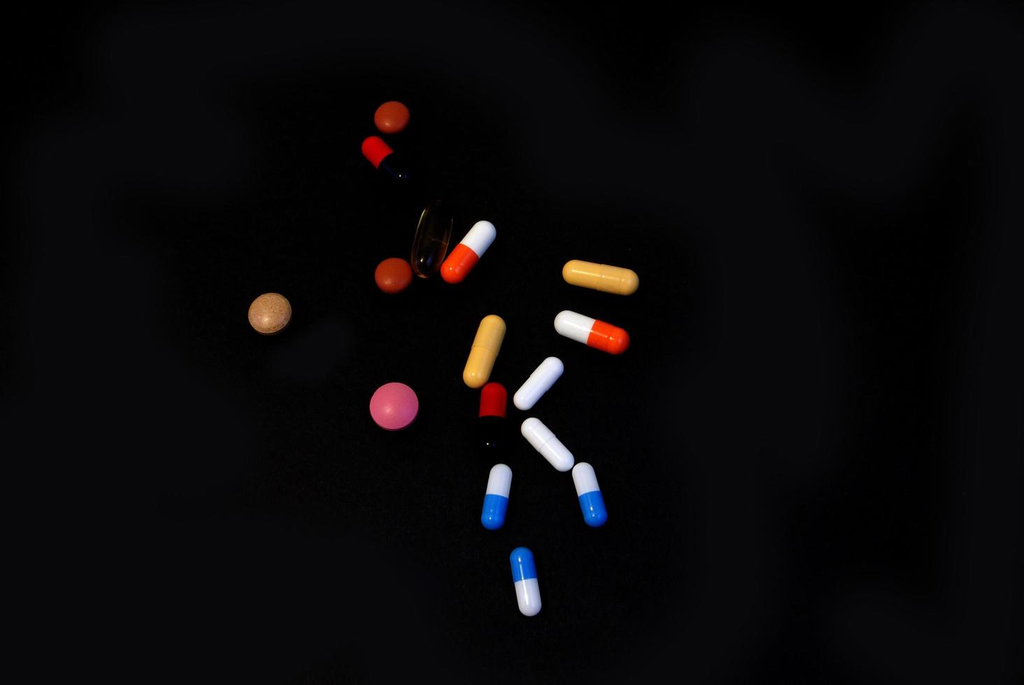 pills on black photo