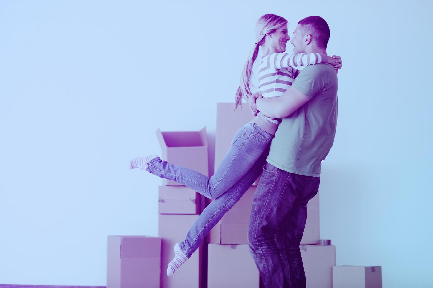 Young couple moving in new house photo