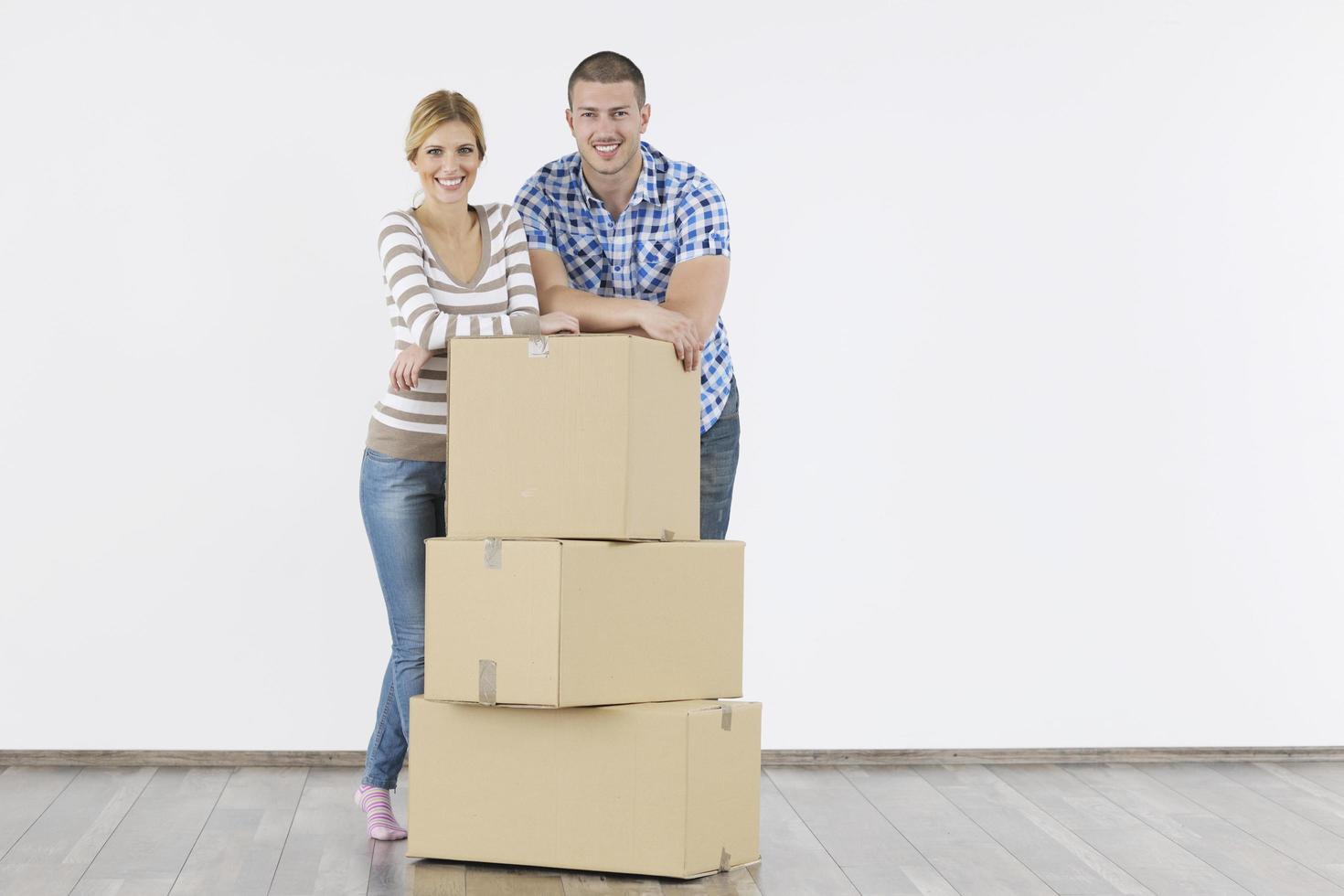 Young couple moving in new home photo