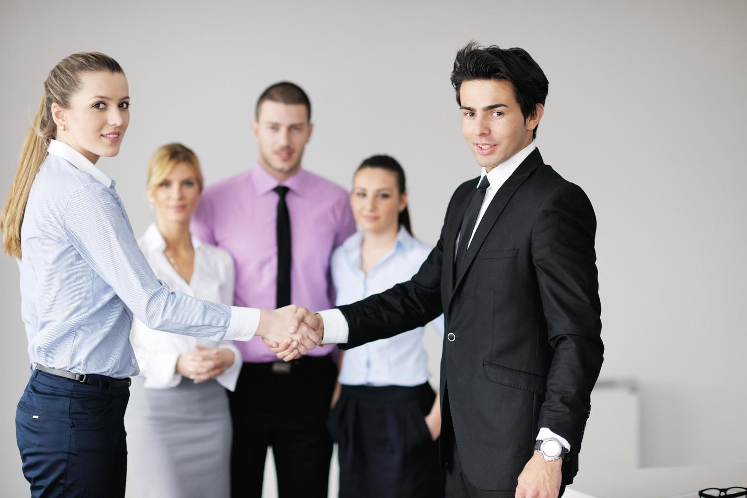 Group of young business people at meeting photo