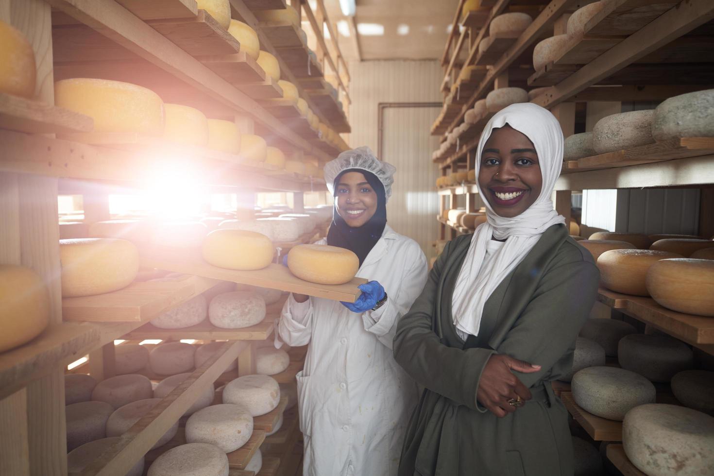 business woman team in local  cheese production company photo