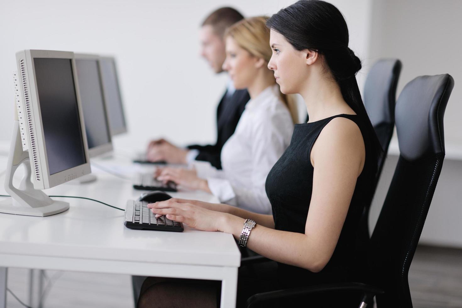 business people group working in customer and help desk office photo