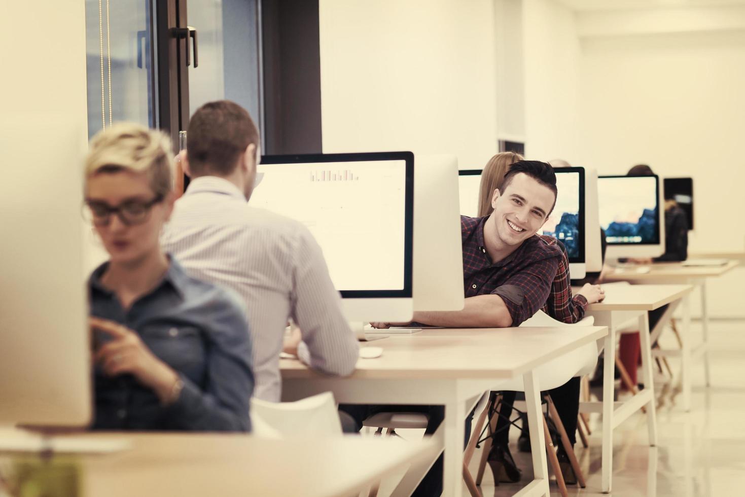 startup business, software developer working on desktop computer photo