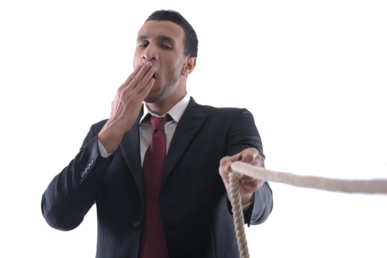 business man with rope isolated on white background photo