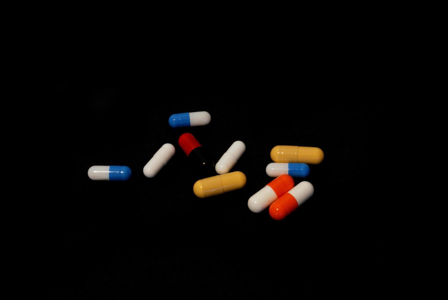 pills on black photo