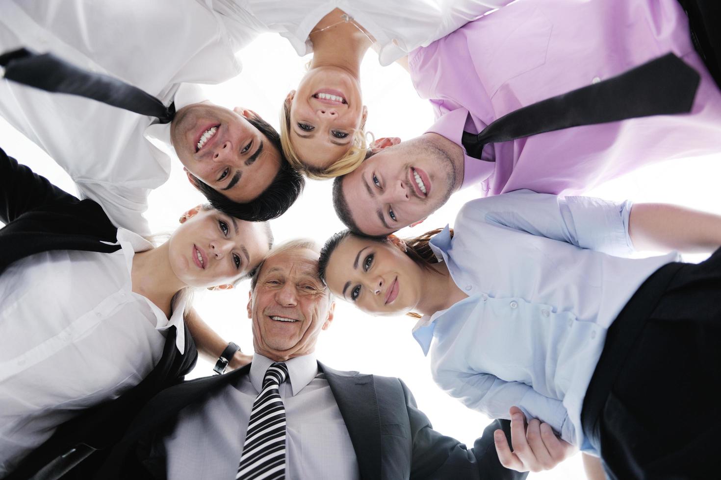 business people with their heads together 12114807 Stock Photo at Vecteezy
