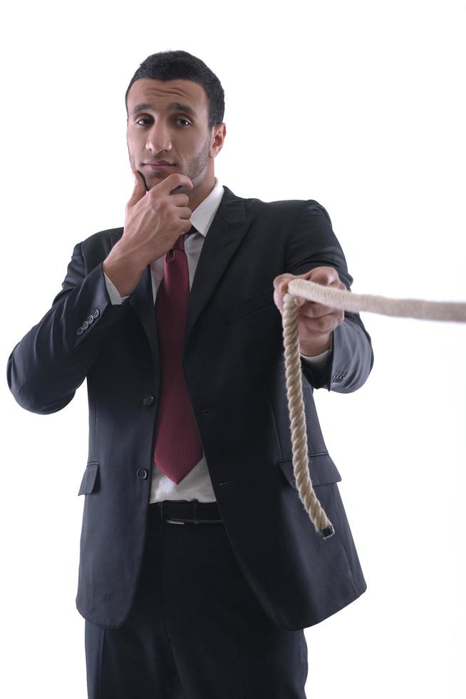 business man with rope isolated on white background photo