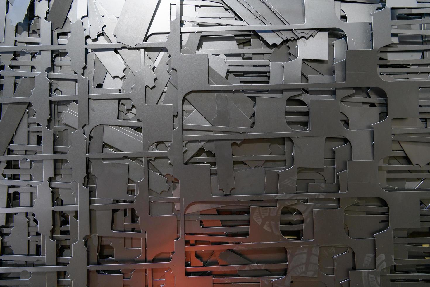 parts of the waste after processing on a laser cnc machine. scrap metal. metal residues after laser cutting photo