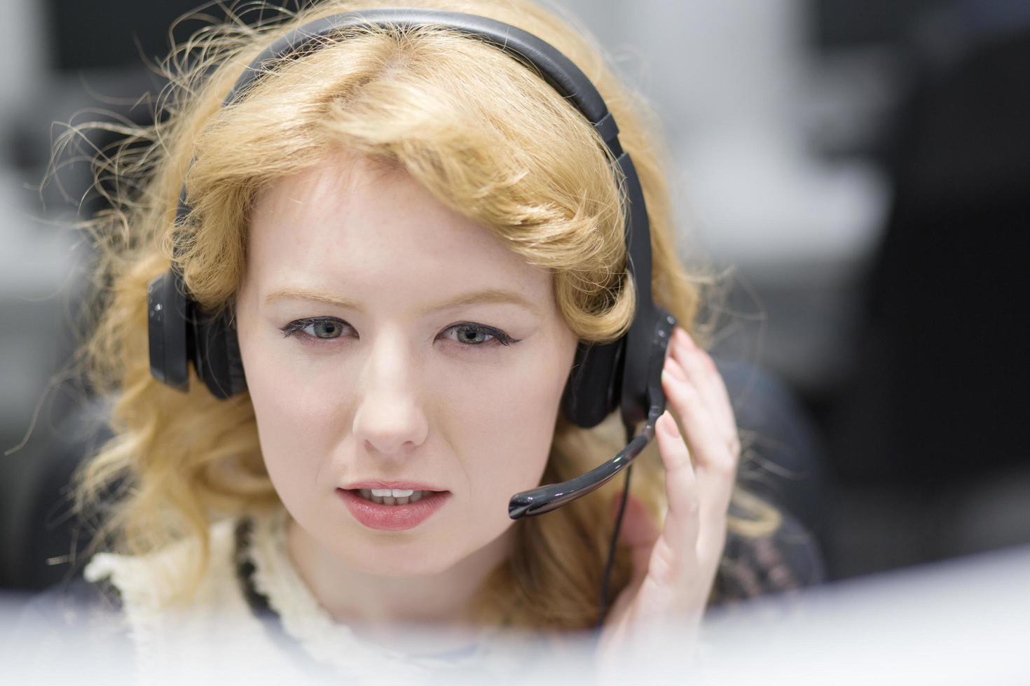 female call centre operator doing her job photo