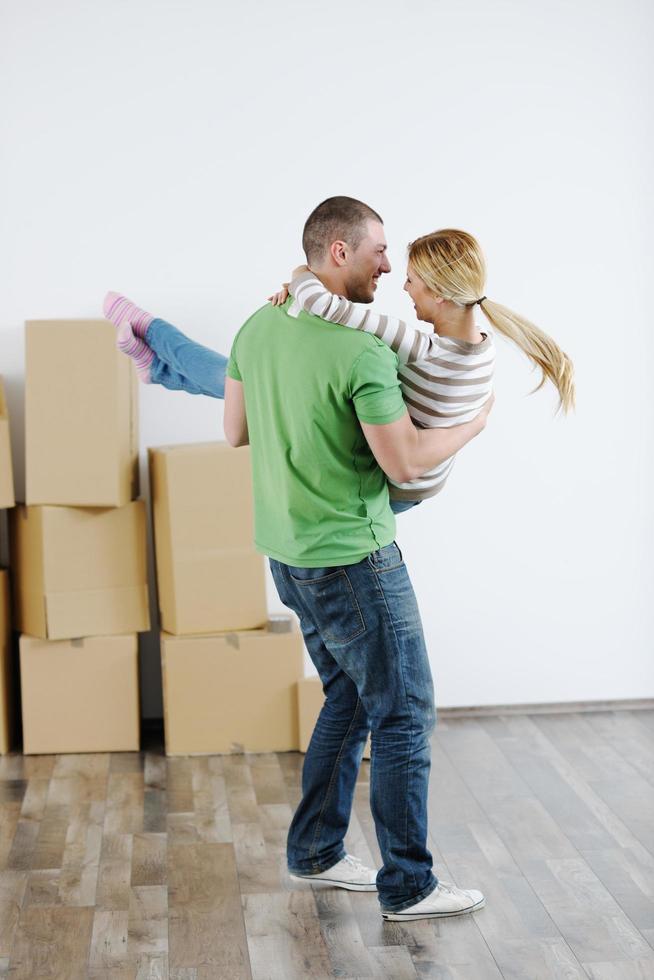 Young couple moving in new house photo