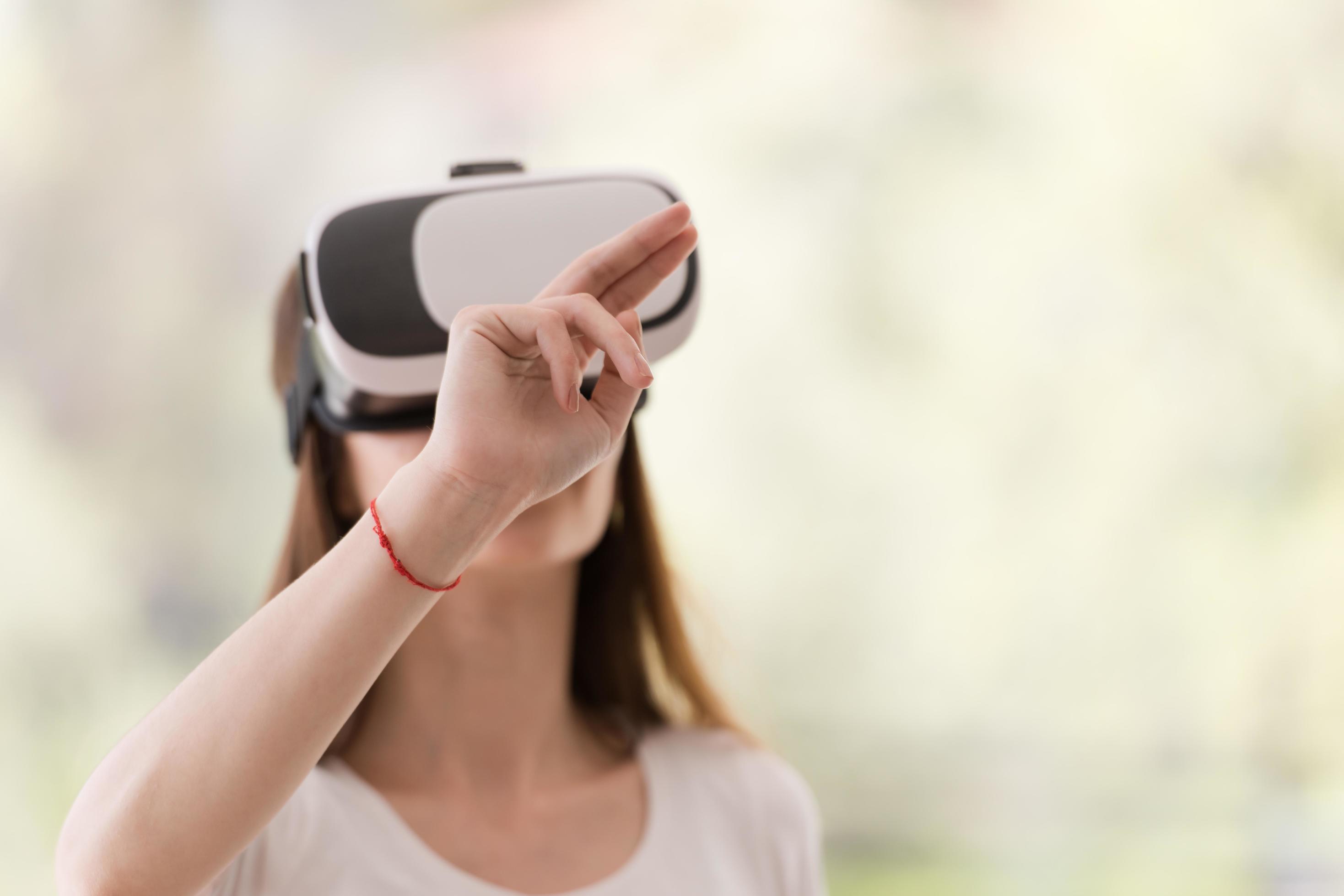 woman using VRheadset glasses of virtual reality 12115470 Stock Photo