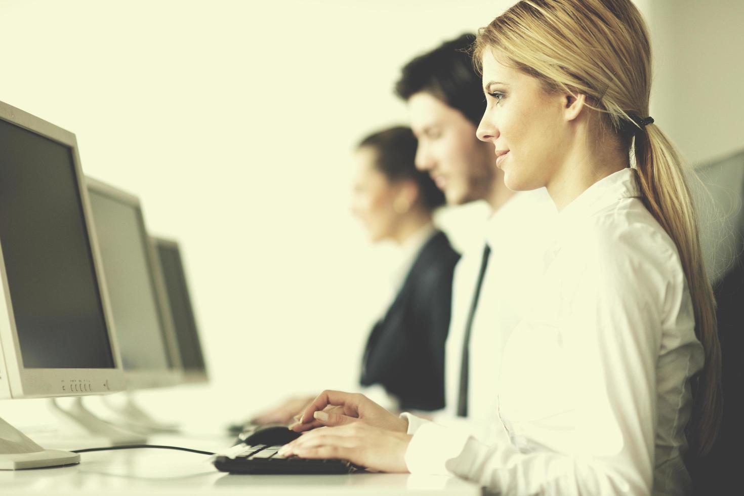 business people group working in customer and helpdesk office photo