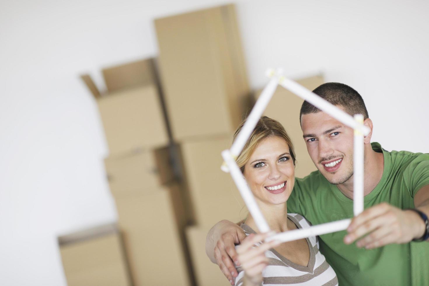 Young couple moving in new home photo