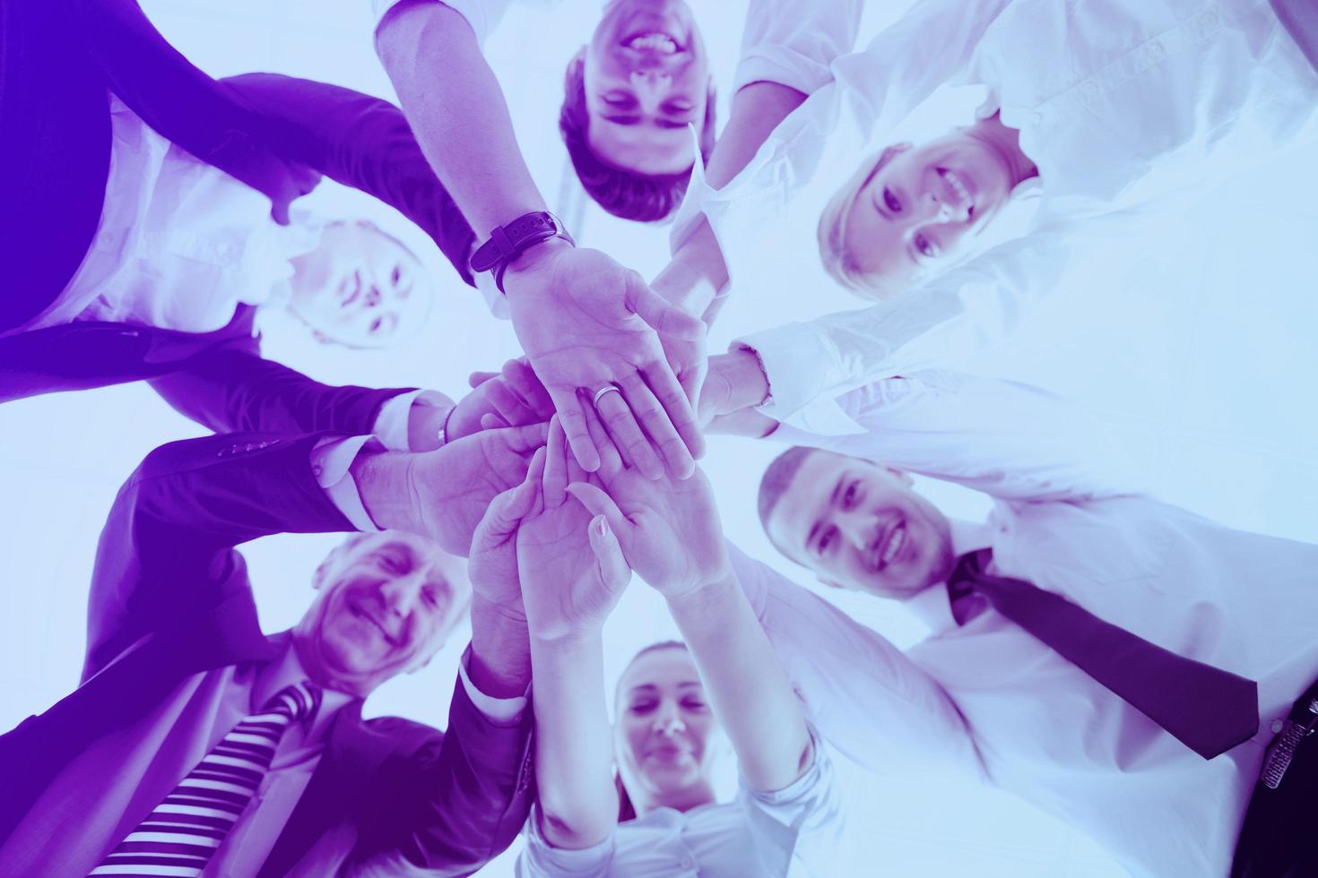 business people group joining hands photo